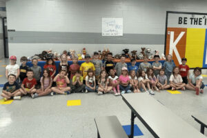 The Cameron Elementary 1st graders are pictured with their stuffed animals that have prosthetics made by them.